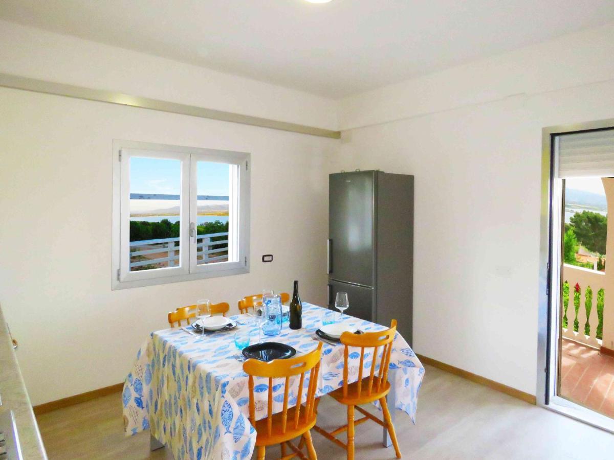 Panohome Porto Pino Exteriör bild