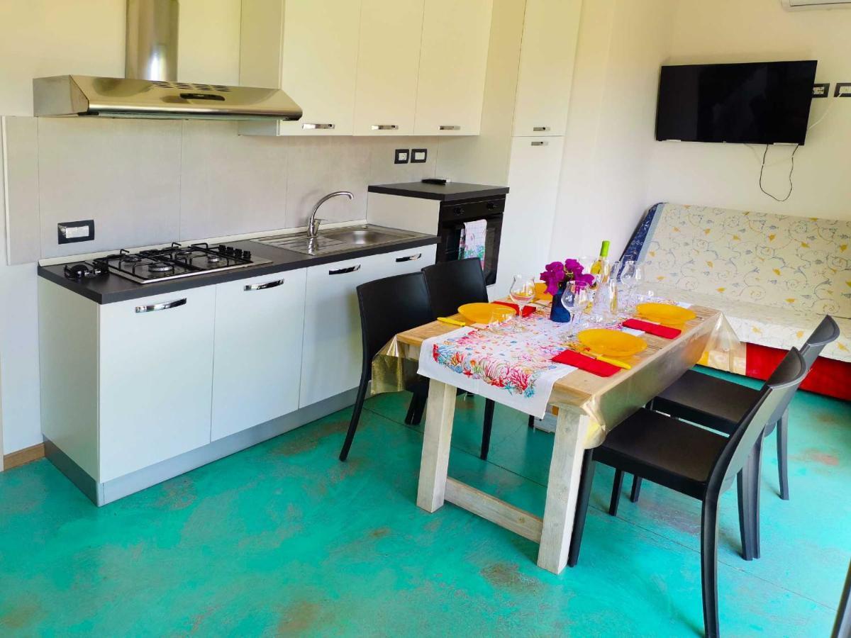 Panohome Porto Pino Exteriör bild