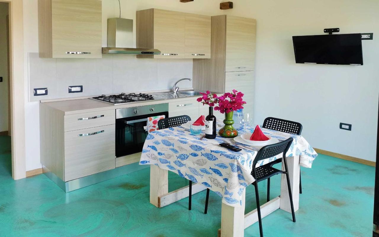 Panohome Porto Pino Exteriör bild