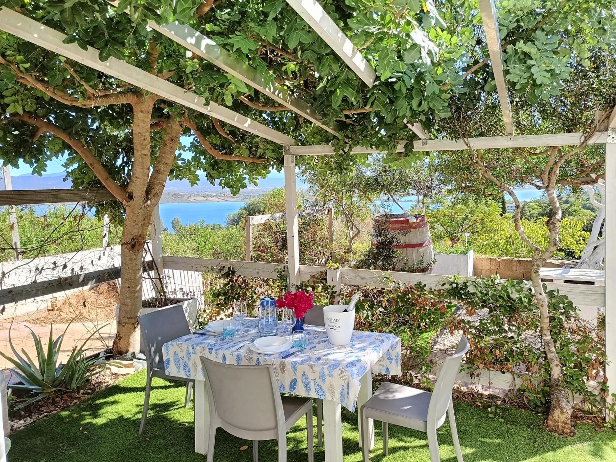 Panohome Porto Pino Exteriör bild