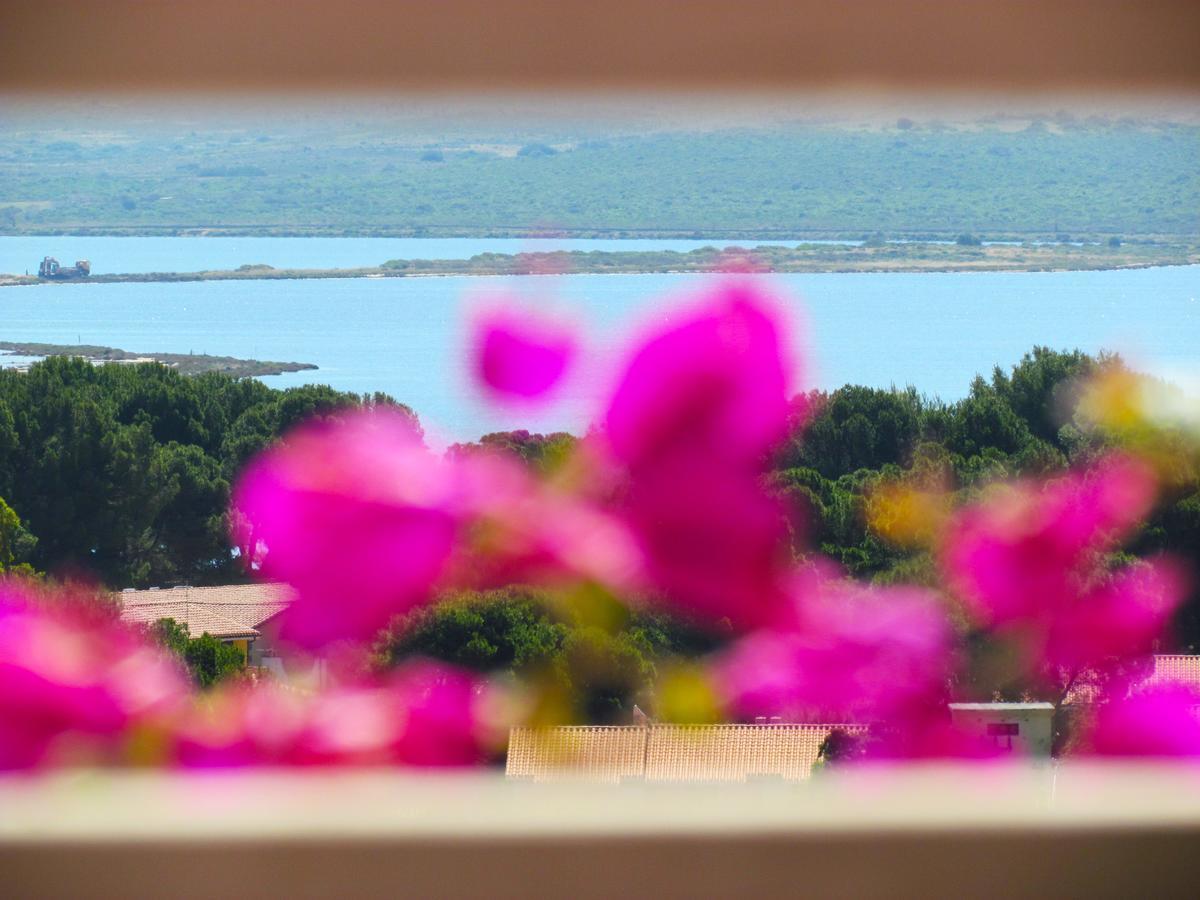 Panohome Porto Pino Exteriör bild